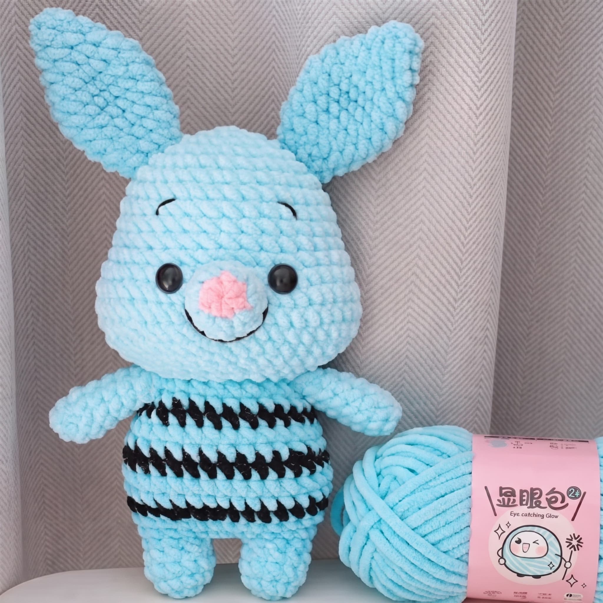 A soft crocheted amigurumi woodland animal.