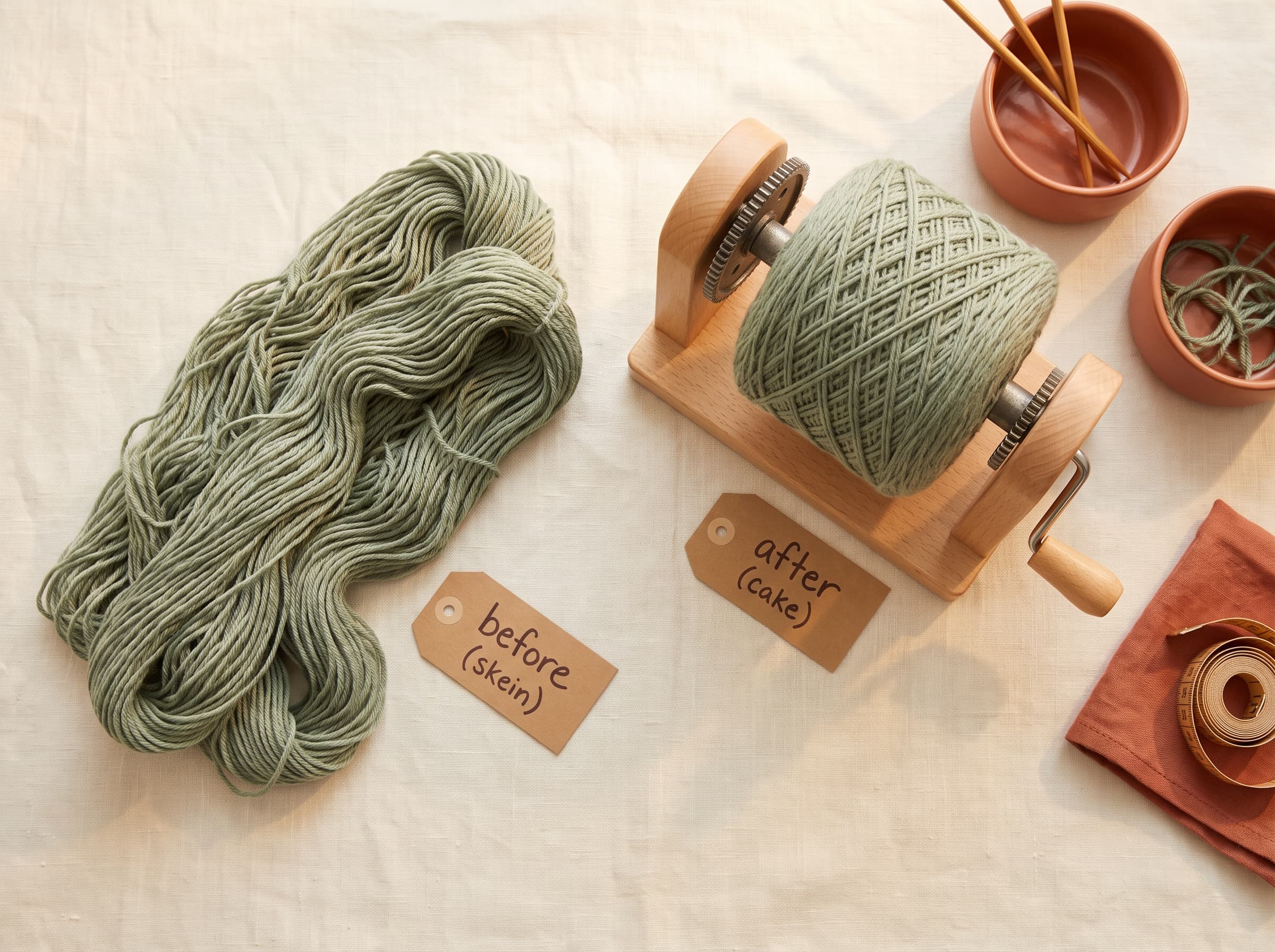 A yarn winder with a wound yarn cake beside a loose skein, labeled before and after.